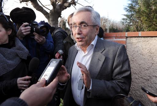 Pinsaguel's mayor Jean-Louis Coll (C) answers journalists' questions after a meeting with the parents of the teenagers who had left his school to go and fight for the Jihad in Syria, on January 28, 2014