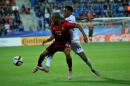Joao Mario of Portugal and Nathaniel Chalobah of England (R) vie for the ball during the UEFA Under-21 European Championship football match in Uherske Hradiste, Czech Republic on June 18, 2015