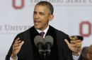 Obama uses commencement address to take shots at opponents