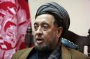 Mohammad Mohaqiq, deputy to Afghanistan's Chief Executive Abdullah Abdullah, speaks during an interview with The Associated Press in Kabul, Afghanistan, Saturday, April, 4, 2015. Mohaqiq, Afghanistan's senior Shiite community leader, said on Saturday the Islamic State group is responsible for the abduction of 31 members of the minority Shiite Hazara community on Feb. 24 in the southern Zabul province. (AP Photo/Rahmat Gul)