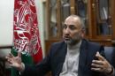 In this Saturday, Oct. 24, 2015, photo, Afghan National Security Adviser Mohammad Hanif Atmar speaks during an interview with The Associated Press, in Kabul, Afghanistan. According to Atmar, Afghanistan is in danger of once again becoming a safe haven for terrorists wanting to carry out attacks like the Sept. 11, 2001 atrocities in the United States, and needs the help of the U.S. and NATO countries to ensure victory in its fight to eliminate these groups from within its borders. (AP Photo/Rahmat Gul)