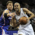 San Antonio Spurs' Tony Parker, right, of France, drives around Los Angeles Clippers' Blake Griffin during the first half of an NBA basketball game, Friday, March 29, 2013, in San Antonio. (AP Photo/Darren Abate)