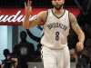 Brooklyn Nets' Deron Williams gestures after scoring a 3-point basket during the first half of NBA basketball game against the Washington Wizards, Friday, March 8, 2013, in New York. (AP Photo/Mary Altaffer)
