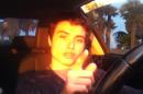 FILE - This file image from video posted on YouTube shows Elliot Rodger. Law officers who visited Rodger three weeks before he killed six college students near a Santa Barbara university were aware that he had posted disturbing videos but didn't watch them, and they didn't know about his final video detailing his "Day of Retribution" until after the deadly rampage, officials said. (AP Photo/YouTube, File)