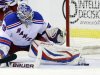 New York Rangers goalie Henrik Lundqvist (30), from Sweden, stops the puck with his skate, in the first period, of Game 7 first-round NHL Stanley Cup playoff hockey series against the Washington Capitals, Monday, May 13, 2013 in Washington. (AP Photo/Alex Brandon)