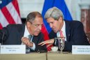 Russian Foreign Minister Sergey Lavrov (L) and US Secretary of State John Kerry in Washington, August 9, 2013