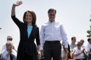 FILE - In this May 3, 2012, file photo, Republican presidential candidate, former Massachusetts Gov. Mitt Romney and Rep. Michele Bachmann, R-Minn., arrive at a campaign stop in Portsmouth, Va. Remember Newt Gingrich calling Mitt Romney a liar? Bachmann saying Romney's unelectable? Rick Santorum calling Romney "the worst Republican in the country" to run against Obama? They're hoping you don't. And acting like it never happened _ even though most of their words are just clicks away online.(AP Photo/Jae C. Hong, File)