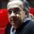 Fiat CEO Marchionne poses after the presentation of the new LaFerrari hybrid car on the Ferrari in Geneva