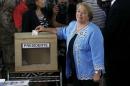 Chilean presidential candidate Michelle Bachelet casts her ballot during the presidential election in Santiago