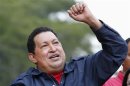 Venezuelan President and presidential candidate Chavez greets supporters during a campaign rally in the district of Catia in Caracas