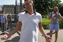 Prominent anti-corruption blogger and opposition leader Alexei Navalny gestures after leaving the Investigative Committee of the Russian Federation in Moscow