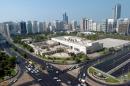 An Emirati woman has been referred to court on charges of murdering one American in an Abu Dhabi mall, general view of Abu Dhabi seen here, and attempting to kill another at his home, officials said Sunday