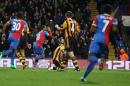 Crystal Palace's Jason Puncheon, second left, celebrates after scoring the opening goal during their English Premier League soccer match between Crystal Palace and Hull City at Selhurst Park stadium in London Tuesday, Jan. 28, 2014.(AP Photo/Alastair Grant)