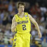 Michigan guard Spike Albrecht (2) reacts against the Louisville during the first half of the NCAA Final Four tournament college basketball championship game Monday, April 8, 2013, in Atlanta. (AP Photo/Charlie Neibergall)