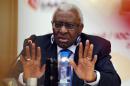 Then International Association of Athletics Federations (IAAF) president Lamine Diack speaks during a press conference in Beijing on August 21, 2015 ahead of the 2015 IAAF World Championships