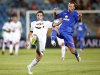 Real Madrid's Higuain and Getafe's Alexis fight for the ball during their Spanish first division soccer match in Getafe