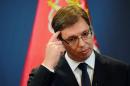 Serbian Prime Minister Aleksandar Vucic says he will go to Srebrenica on July 11 to attend ceremonies for the 20th anniversary of the massacre when Bosnian Serb forces killed 8,000 Muslim men and boys