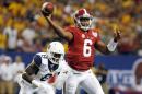 Alabama quarterback Blake Sims (6) throws under pressure from West Virginia safety Karl Joseph (8) during the first half of an NCAA college football game Saturday, Aug. 30, 2014, in Atlanta. (AP Photo/ Brynn Anderson)