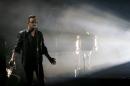 Bono lead singer of the band U2 performs during Bambi 2014 media awards ceremony in Berlin