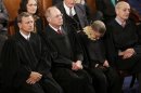 U.S. Supreme Court Justices Roberts, Kennedy, Bader Ginsburg and Breyer listen as U.S. President Obama delivers his State of the Union speech on Capitol Hill in Washington