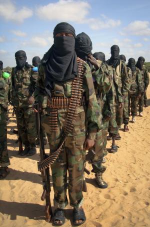 FILE - Armed members of the militant group al-Shabab &hellip;