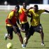 Ghana's Gyan is challenged by Akaminko during a training session ahead of their African Nations Cup soccer match against Mali, at the Nelson Mandela Bay Stadium in Port Elizabeth