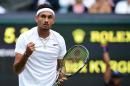 Australia's Nick Kyrgios celebrates a point against Britain's Andy Murray during their men's singles fourth round match on the eighth day of the 2016 Wimbledon Championships on July 4, 2016