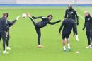 Manchester City's Ivorian striker Wilfried Bony (C) participates during a team training session in Manchester, northern England on April 11, 2016