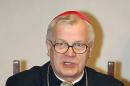 FILE - In this March 18, 2004 file picture the leader of Poland's Catholic church, Archbishop Jozef Michalik, addresses a news conference at the building of Poland's Episcopate in Warsaw, Poland, after being elected the head of the Polish Episcopal Conference, succeeding the retiring Cardinal Jozef Glemp. Michalik recently came under fierce criticism for appearing to suggest that children are partly to blame for being sexually abused by priests. ( AP Photo/Czarek Sokolowski)