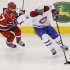 Canadiens' Subban battles Hurricanes' Brent for the puck during their NHL hockey game in Raleigh