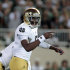 Notre Dame quarterback Everett Golson signals during the first quarter of an NCAA college football game against Michigan State, Saturday, Sept. 15, 2012, in East Lansing, Mich. (AP Photo/Al Goldis)