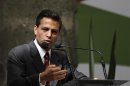 Enrique Pena Nieto, presidential candidate from PRI, gives a speech during the First Citizen Summit in Mexico City
