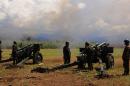 Philippine troops fire their 105mm howitzer cannons towards Islamic militant group positions from their base near Butig town in Lanao del Sur province, on the southern island of Mindanao, on November 27, 2016