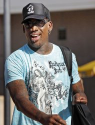 Dennis Rodman arrives at family court in Orange Calif., on Tuesday, May 29, 2012. The flamboyant former NBA player is expected to be sentenced for contempt in a long-running divorce case in Orange County. Rodman was found guilty of four counts of contempt for failing to pay child support for his two children. (AP Photo/Nick Ut)