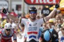 Omega Pharma-Quick Step team rider Mark Cavendish of Britain celebrates as he wins the 228.5 km fifth stage of the centenary Tour de France cycling race from Cagnes-Sur-Mer to Marseille