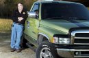 Jeffrey Nelson poses with his truck in rural Walker County in Alabama