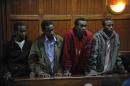 (From Right)Abdi Mohamed Ahmed, Liban Abdulle Omar, Adan Mohamed Ibrahim and Hussein Mustafa Hassan -- the four men charged in connection with the Westgate mall massacre -- appear at a Kenyan court in Nairobi, on November 11, 2013