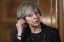 Britain's Prime Minister Theresa May holds a press conference with her counterpart from Italy Paolo Gentiloni at Number 10 Downing Street in London