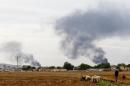 Smoke rises over the Syrian town of Kobani