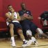 USA men's basketball national team members Russell Westbrook, left, hangs out with teammate Kobe Bryant after practice at the Mendenhall Center on the UNLV campus in Las Vegas on Friday, July 6, 2012. (AP Photo/Las Vegas Review-Journal, Jason Bean)