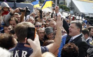 Ukrainian President Petro Poroshenko raises his fist&nbsp;&hellip;