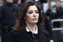 Celebrity chef, Nigella Lawson, arrives at Isleworth Crown Court in London, Wednesday, Dec. 4, 2013. Celebrity chef Nigella Lawson could face questions Wednesday about alleged drug use when she appears as a witness at the fraud trial of her former personal assistants. Lawson is due to testify as a prosecution witness against Italian sisters Elisabetta and Francesca Grillo. The pair are accused of living the high life by using credit cards loaned to them by Lawson and her ex-husband Charles Saatchi. (AP Photo/Sang Tan)