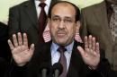 FILE - In this Friday, March 26, 2010, file photo, Iraqi Prime Minister Nouri al-Maliki speaks to the press in Baghdad, Iraq. Iraq's Vice President Khudeir al-Khuzaie called on parliament to convene on Tuesday, July 1, 2014, taking the first step toward forming a new government to present a united front against a rapidly advancing Sunni insurgency while Britain's top diplomat started an official visit to the country to urge the country's leaders to put their differences aside for the good of the nation. Al-Maliki's political bloc won the most seats in April 30 elections, but he needs support from other blocs to govern with a majority. His efforts to form a coalition have been complicated by the current crisis as critics blame his failure to promote national reconciliation for the Sunni anger fueling the insurgent gains and want him to step down. (AP Photo/Hadi Mizban, File)