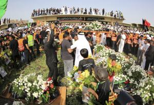 Shi&#39;ite Muslims attend a mass funeral for victims &hellip;