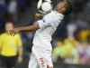 England's Cole jumps for the ball during game against France at their Group D Euro 2012 soccer match at Donbass Arena in Donetsk