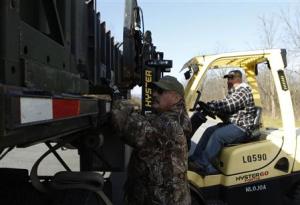 Materiel handlers Snyder and Ellis load Patriot missiles …