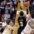 Butler guard Alex Barlow (3) shoots the game-winning shot over Indiana guard Jordan Hulls during the overtime period of an NCAA college basketball game in Indianapolis, Saturday, Dec. 15, 2012. Butler defeated No. 1 Indiana 88-86 in overtime. (AP Photo/Michael Conroy)