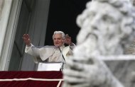 Pope Benedict XVI waves as he leads the Angelus prayer from the window of his private apartments in Saint Peter's Square at the Vatican December 2, 2012. REUTERS/Max Rossi