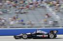 Will Power makes his way through turn four during the Milwaukee Mile IndyCar auto race Sunday, Aug. 17, 2014, in West Allis, Wis. (AP Photo/Morry Gash)