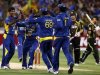Sri Lanka's Kulasekara celebrates with team mates after dismissing Australia's Warner for seven runs during the Twenty20 international cricket match at the Melbourne Cricket Ground